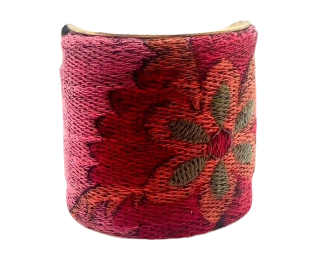 This 3-inch France cuff bracelet blends embroidered velvet floral designs in bold hues with a vintage brass base. A unique, handmade piece from Redd Dott Jewelry.