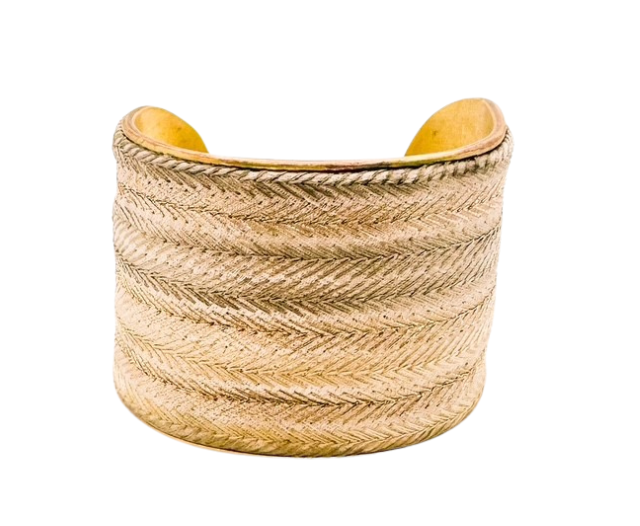 The Glad cuff bracelet by Redd Dott Jewelry is crafted with a gold-tone chevron pattern on a vintage brass base. Handmade in 1-inch and 2-inch sizes.