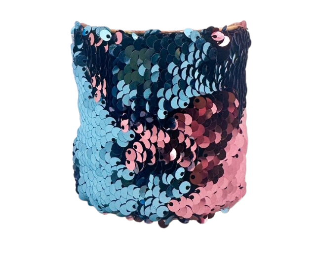 The Let the Good Times Roll cuff bracelet by Redd Dott Jewelry features a bold sequin design with pink and blue hues on a vintage brass base. Handmade in 1-inch, 2-inch, and 3-inch sizes.