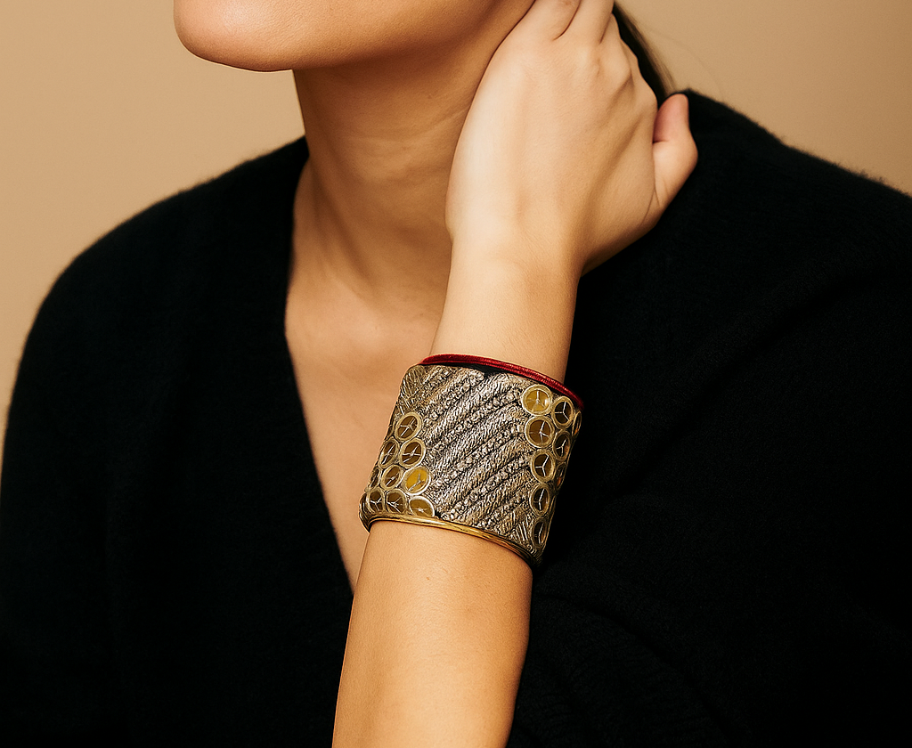 Woman wearing the Athena Custom Quote Cuff Bracelet featuring metallic gold embroidery, mirrored sequins, and bold red trim — handcrafted in Shreveport, LA by Redd Dott Jewelry.