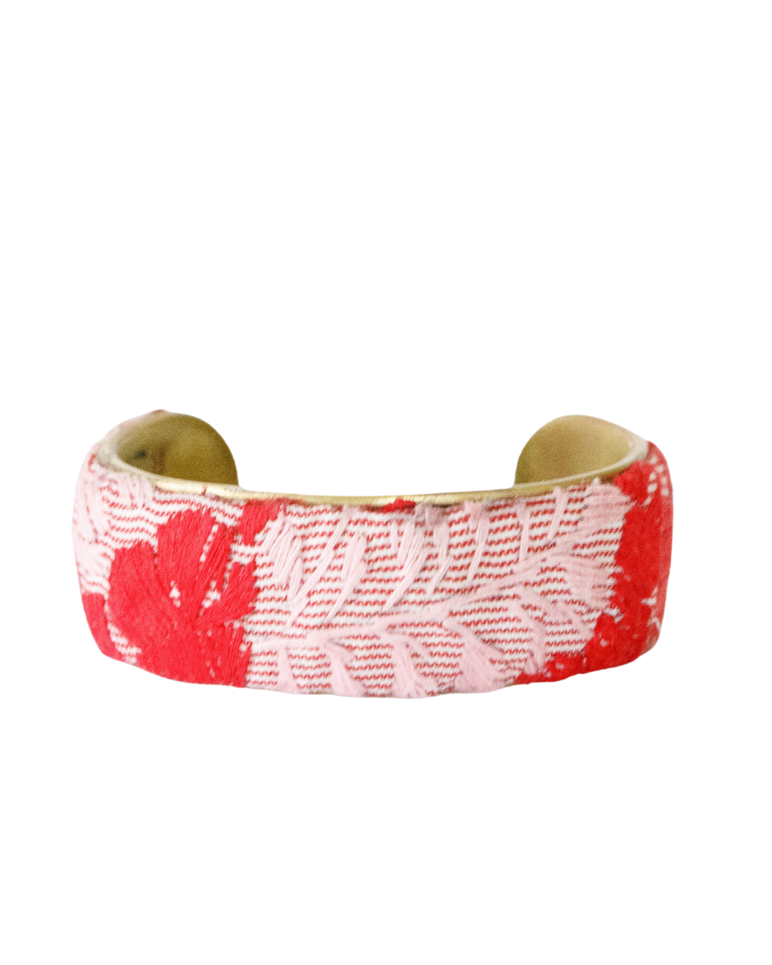 One-inch Corazón Rojo embroidered brass cuff bracelet with blush and crimson threadwork over a pale pink striped base.