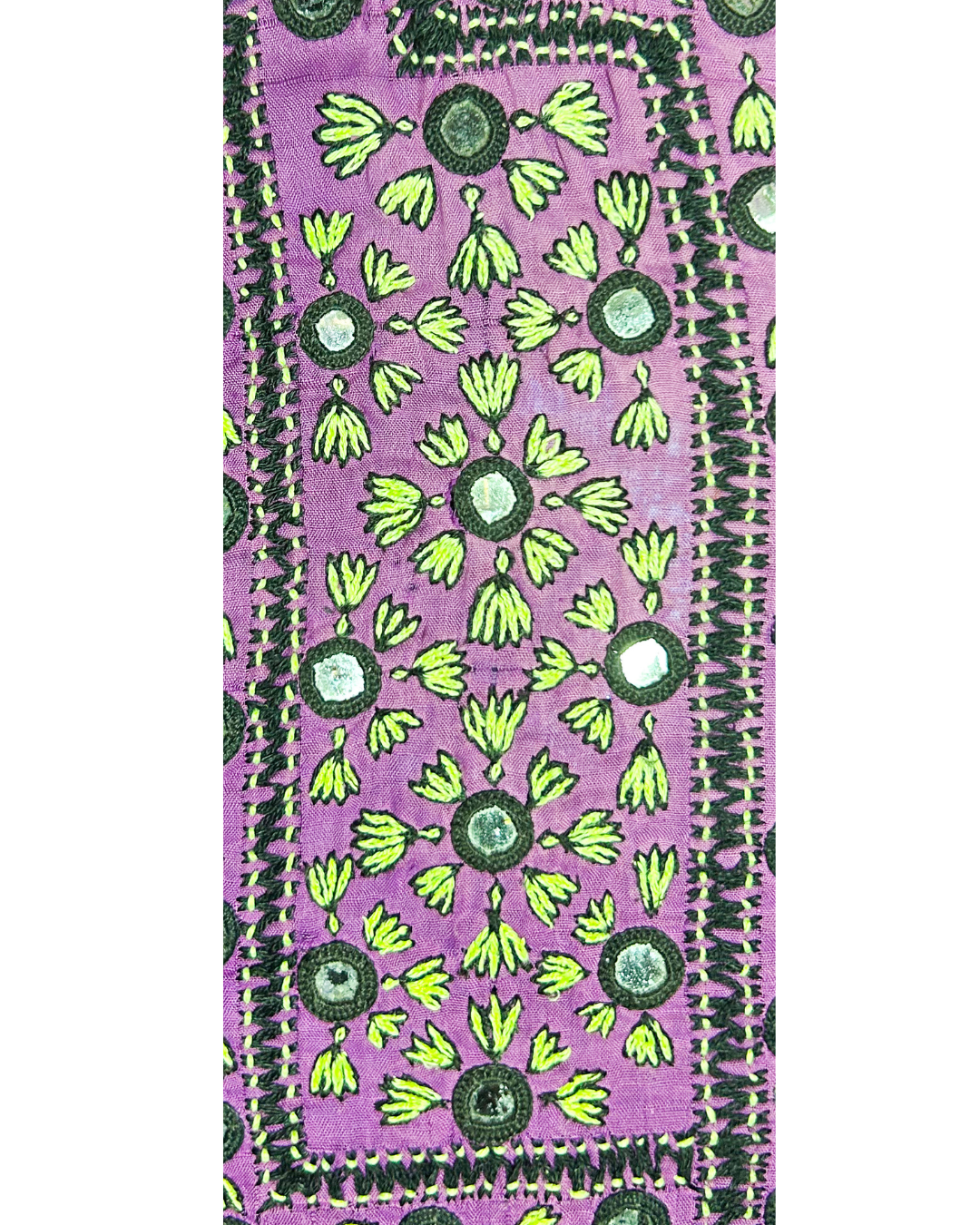 embroidered kaftan fabric in purple, green, and black on a vintage brass bracelet with metallic accents and custom detailing.