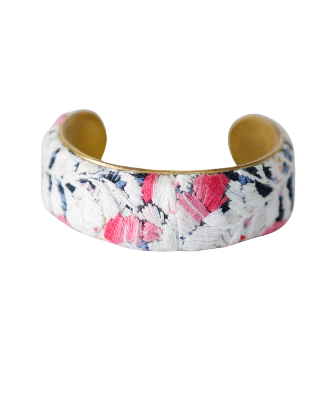 1-inch Flor De Alma cuff bracelet with intricate hot pink and white embroidery on a navy background, crafted over brass.