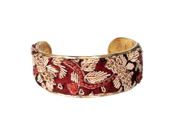 Red silk and pearl beaded cuff bracelet featuring intricate gold embroidery and pearl beading on luxurious red silk fabric, creating an elegant and sophisticated design.
