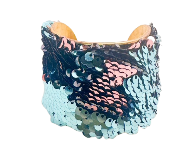 A handcrafted Let the Good Times Roll cuff bracelet by Redd Dott Jewelry, showcasing vibrant pink and blue sequins on a brass base. Offered in multiple sizes with a meaningful message inside.
