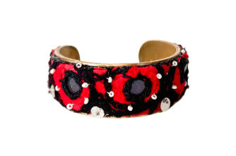 Red and black Native Indian cuff bracelet featuring bold red and black patterns with silver accents, inspired by traditional Native Indian designs.