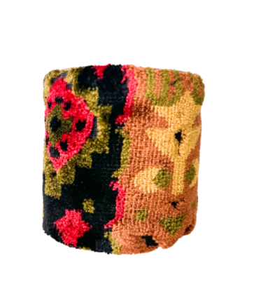 Black and orange fur geometric cuff bracelet featuring bold, textured patterns in vibrant colors, offering a unique and tactile design.