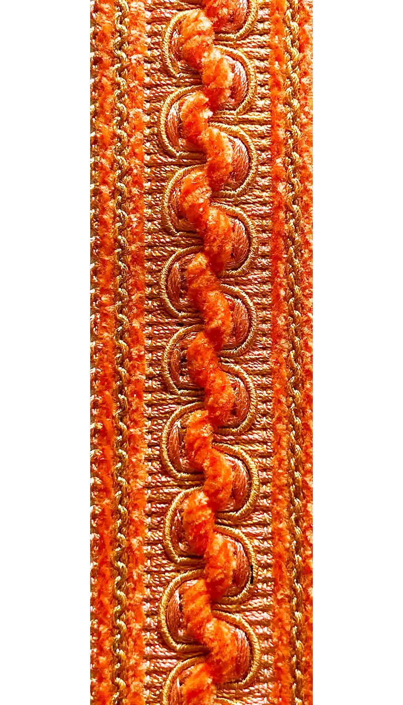 Close-up view of a Customizable Orange Inspirational Jewelry Cuff Bracelet featuring intricate velvet and braided design details in vibrant orange tones.