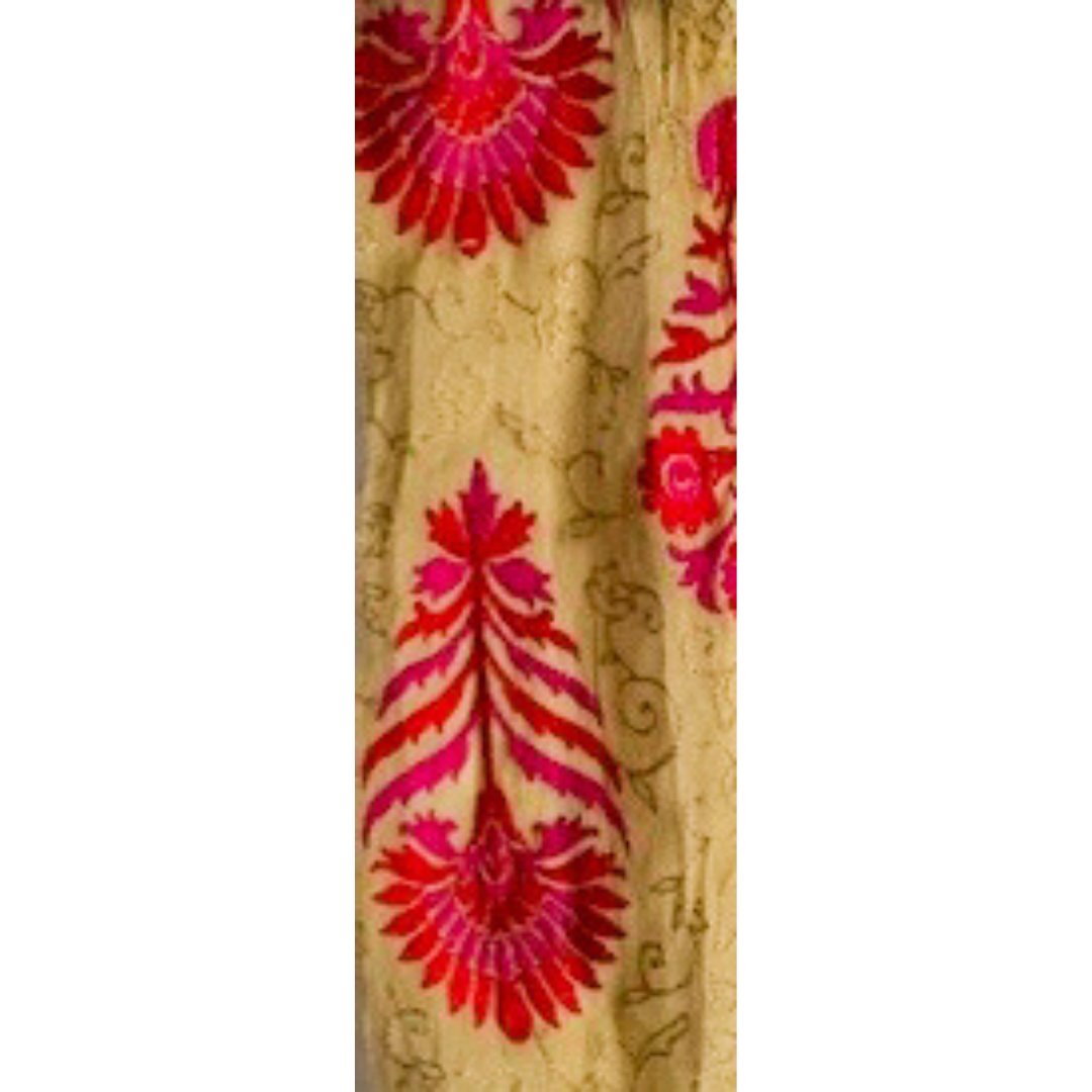 Luxury flower bracelet with a gold fabric base, bold fuchsia and red floral velvet patterns, and intricate scroll embroidery, custom-stamped and handmade by Redd Dott Jewelry.