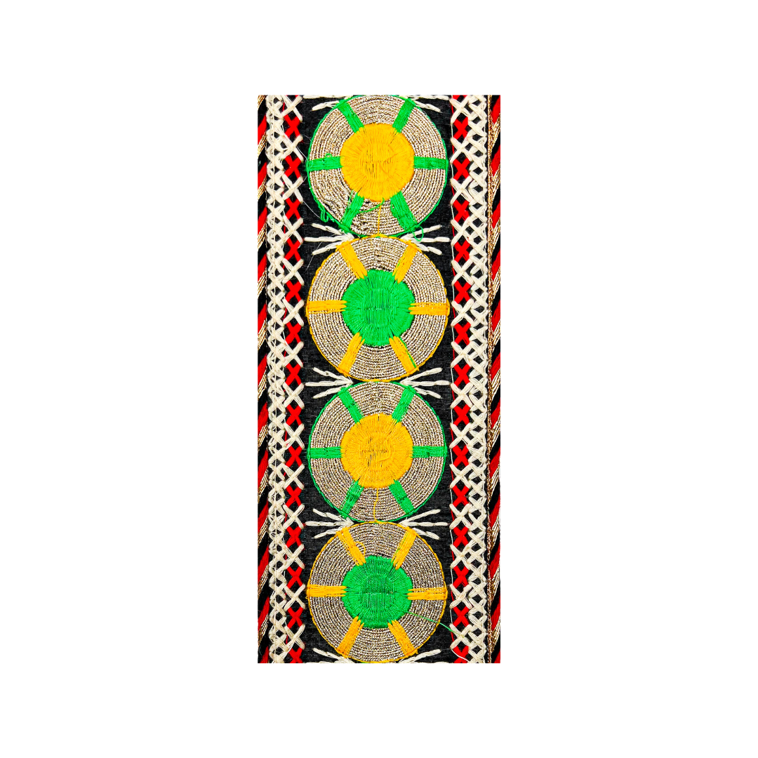 Customizable bold geometric green, black, and gold cuff bracelet with circular patterns, accented by red and white details, creating a striking and intricate design.