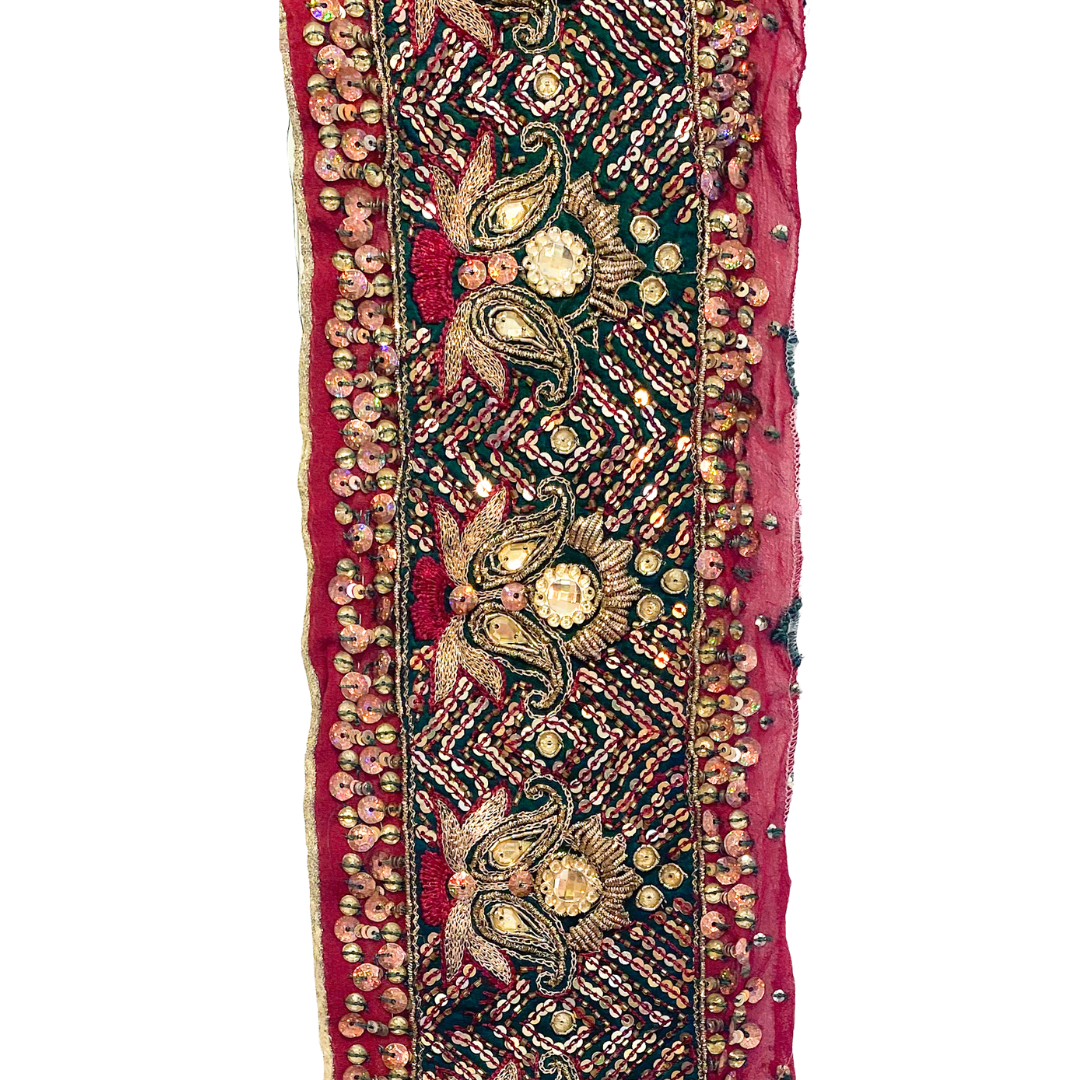 Gold statement bracelet with red fabric, intricate gold embroidery, shimmering sequins, and detailed beadwork, custom-stamped and handmade by Redd Dott Jewelry.