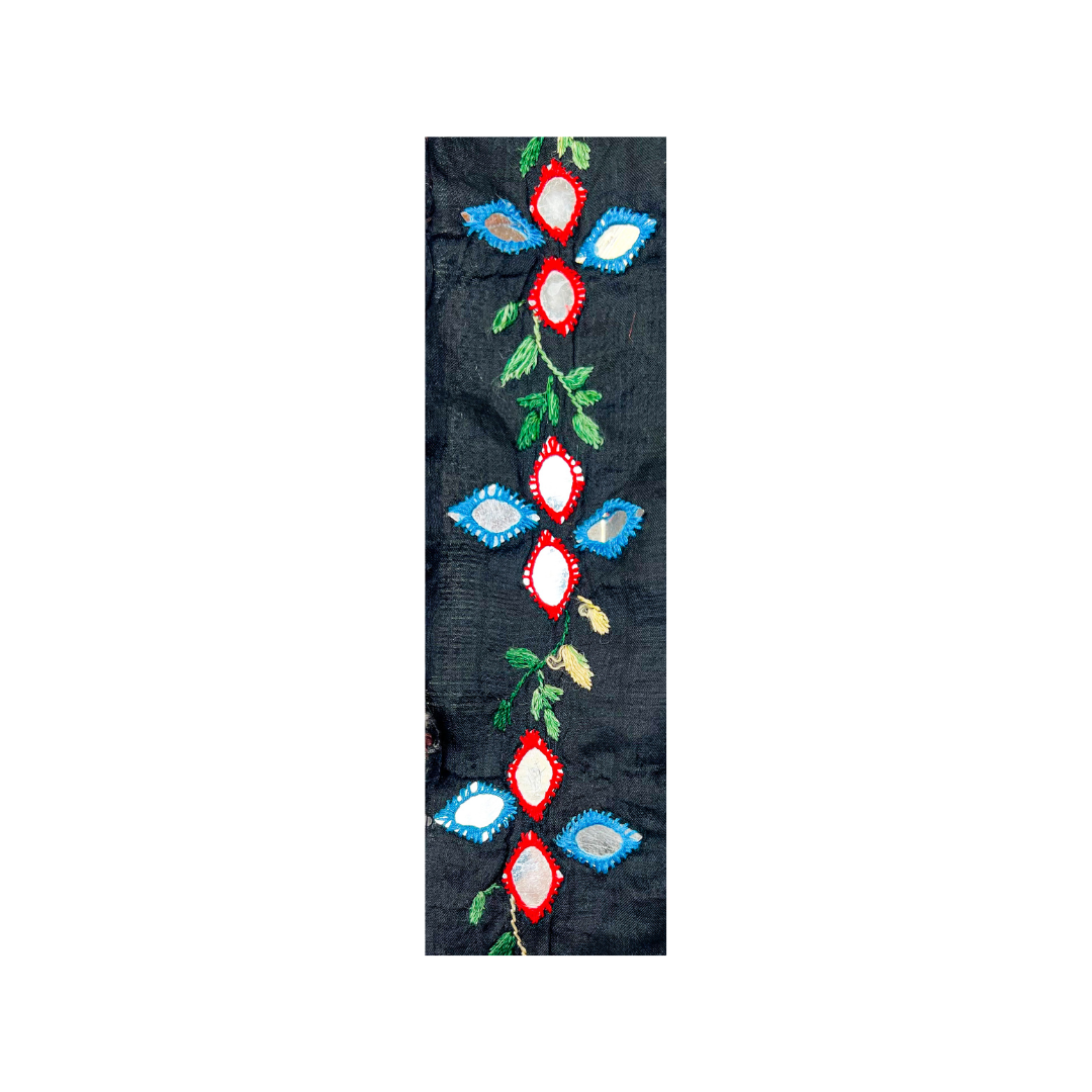 Customizable red and blue floral mirrored cuff bracelet featuring intricate embroidery with vibrant red, blue, and white mirrored accents, enhanced by green leaf motifs on a black background.