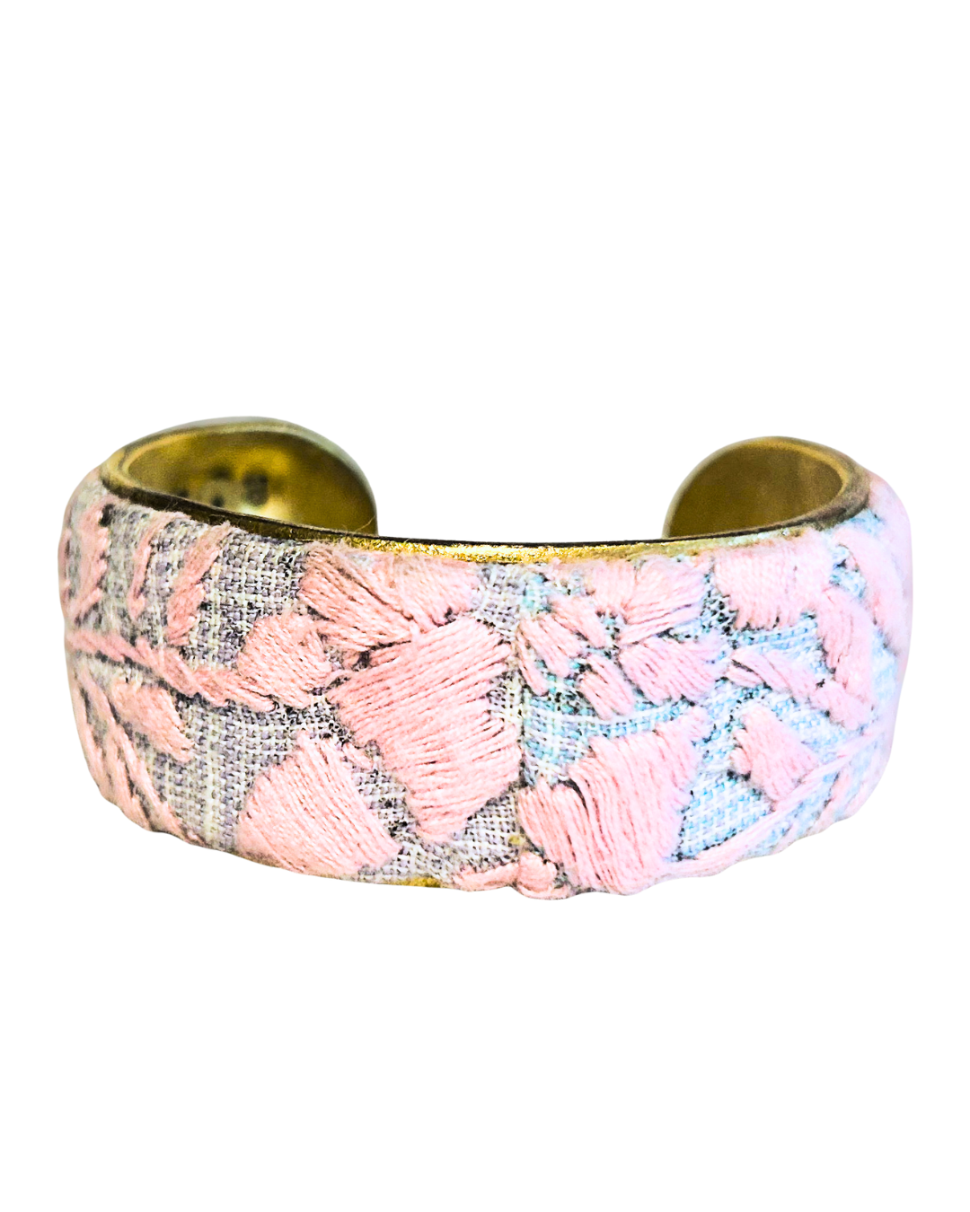 Close-up of 1-inch Rosa De Ceniza brass cuff with pink and gray Mexican floral embroidery from the Margarita Mercantile × Redd Dott collection.