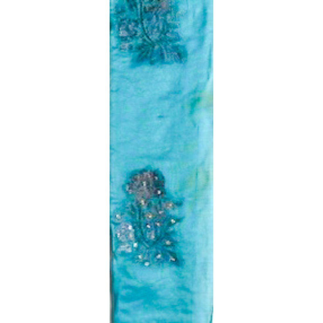 Embroidered jewelry cuff bracelet featuring a soft blue fabric with silver and azure blue floral embroidery, custom-stamped and handmade by Redd Dott Jewelry.