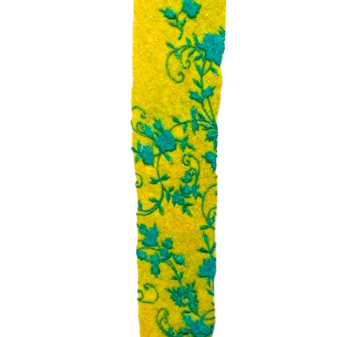 Custom cuff bracelet with vibrant yellow fabric and turquoise floral embroidery, handmade by Redd Dott Jewelry, showcasing the artistry of embroidered jewelry.
