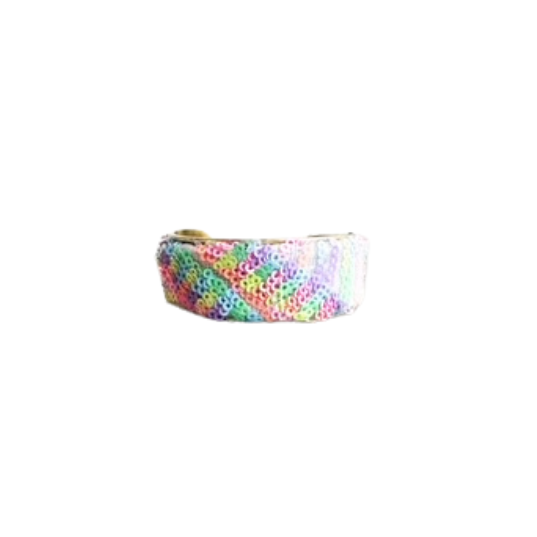 The Zoey Prism cuff is a 1-Inch brass cuff bracelet wrapped in pastel rainbow sequins. A one of a kind jewelry piece with a hidden inspirational quote inside—perfect cuff bracelets for women. Handmade in Shreveport, LA.