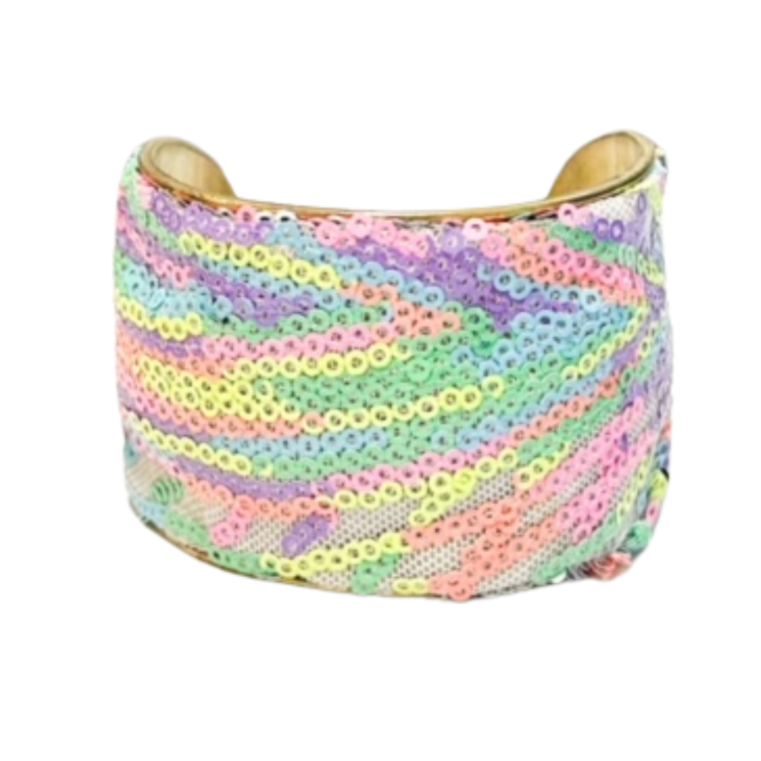 A 2-Inch brass cuff bracelet wrapped in pastel sequins in mint green, lavender, baby blue, yellow, and coral, arranged in swirling stripes, featuring an open-back adjustable design.