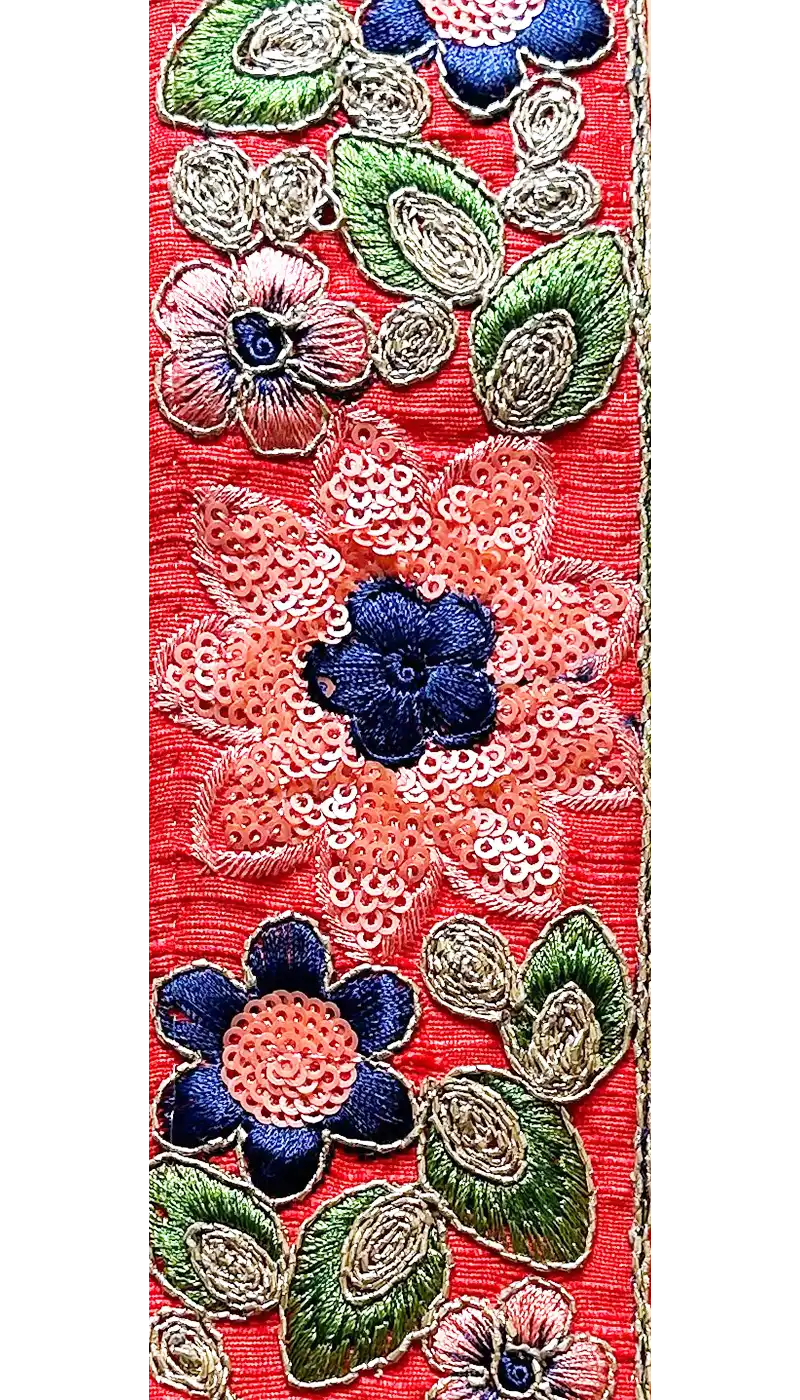 Avalon custom floral cuff bracelet – red embroidered cuff with sequined pink and navy flowers, green leaves, and gold trim, available in two adjustable widths.