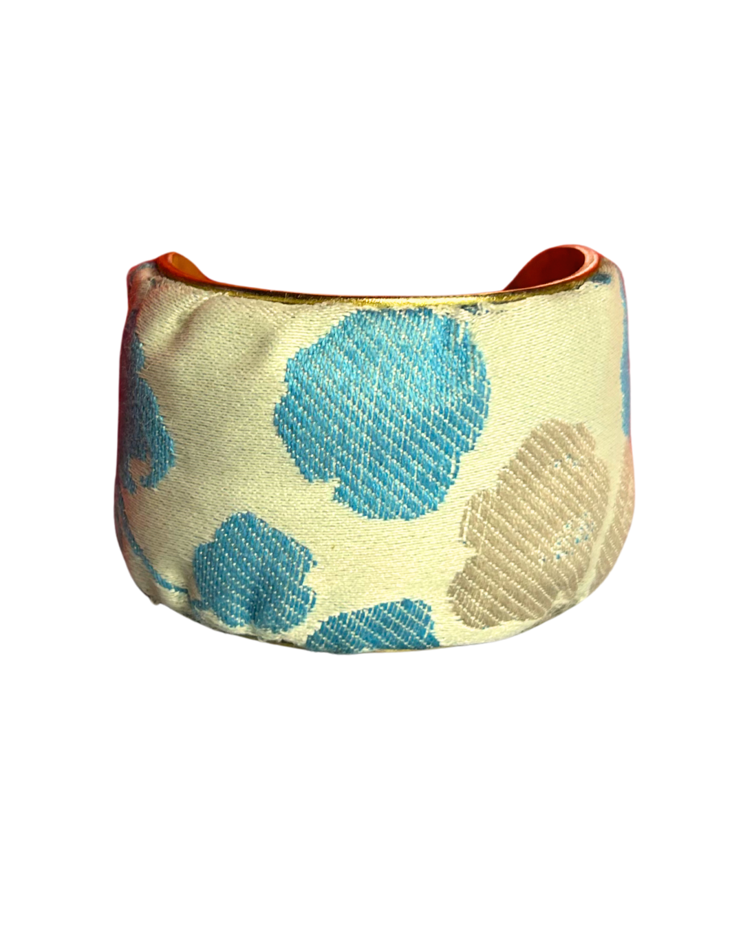 Blossom embroidered statement cuff bracelet featuring ivory satin fabric with powder blue and taupe floral embroidery. One of a kind jewelry handmade by Redd Dott Jewelry in Shreveport, LA.