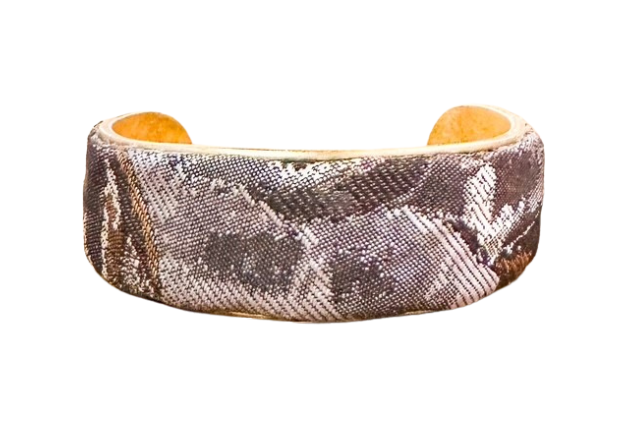 Close-up of grey and gold distressed; abstract cuff bracelet with subtle texture and metallic thread detail, handcrafted in Shreveport, LA by Redd Dott Jewelry.