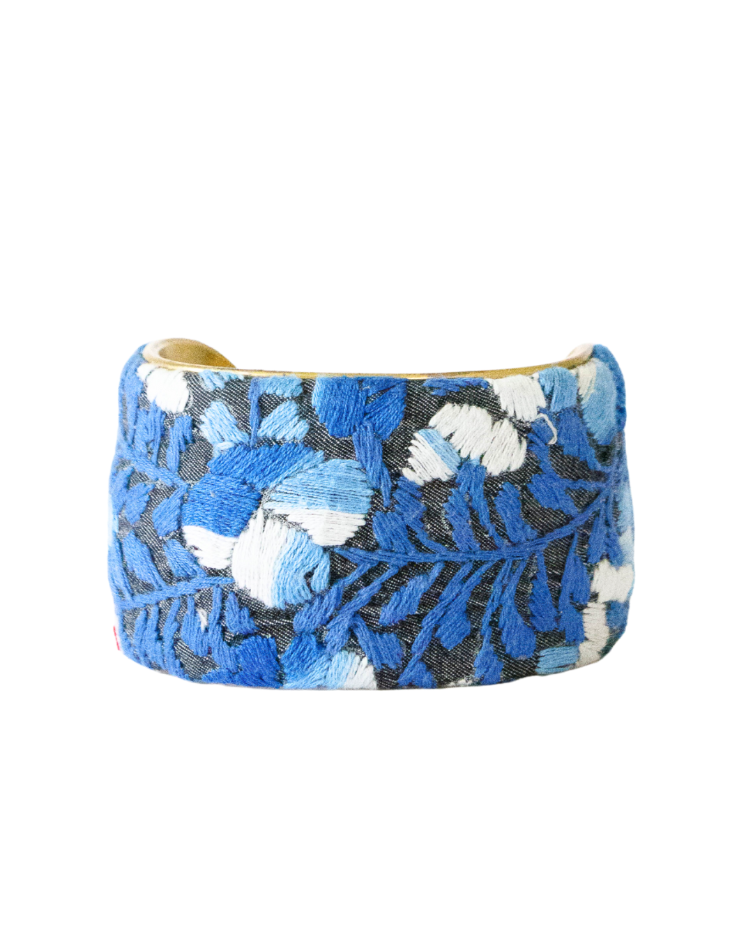 2-inch Azul Profundo brass cuff bracelet with blue floral embroidery inspired by ocean hues and Mexican artisan textiles.
