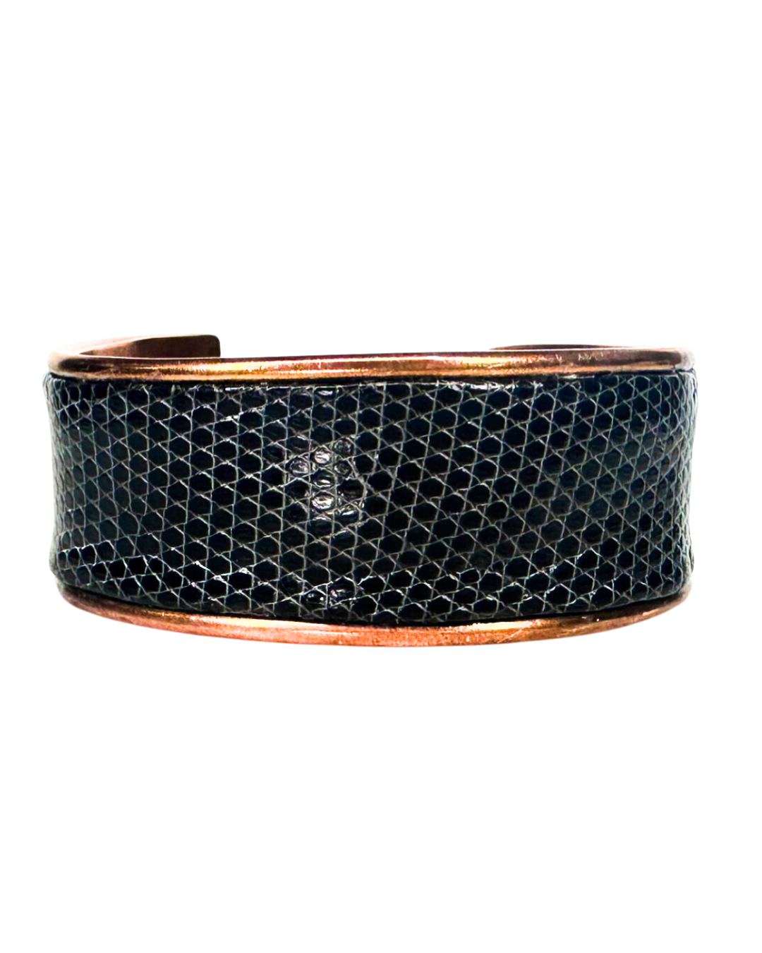 A handcrafted Redd Dott Jewelry cuff featuring genuine lizard skin, celebrating the exotic textures and refined patterns characteristic of nature-inspired jewelry. A sophisticated and unique accessory for lovers of natural elegance.