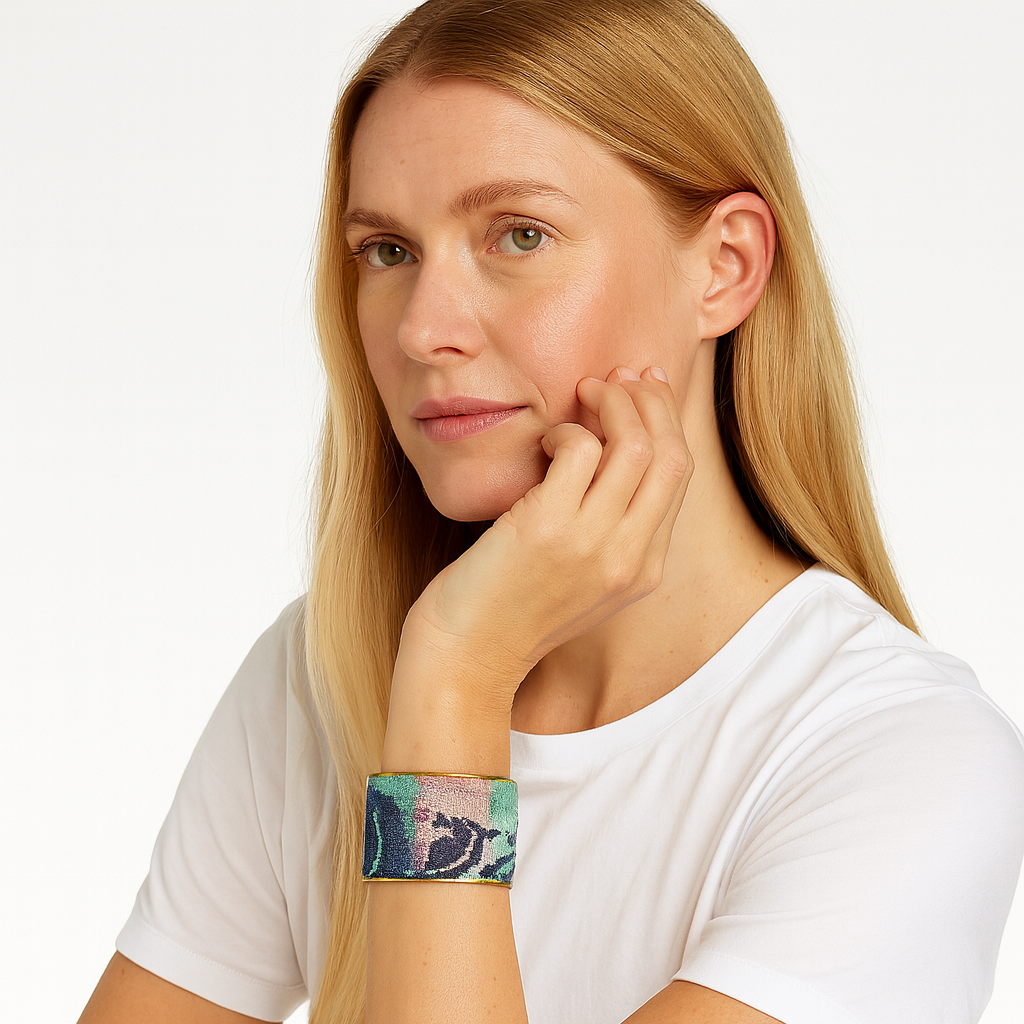 Redd Dott Louisa 2-inch cuff bracelet in soft pastel tones of teal, blush, and lavender with abstract brushstroke patterns, framed by brass for a modern artistic edge.